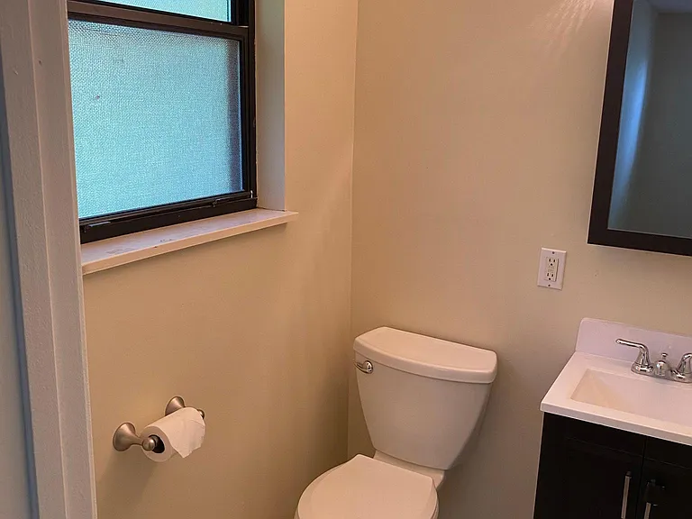 Master bedroom half bath.