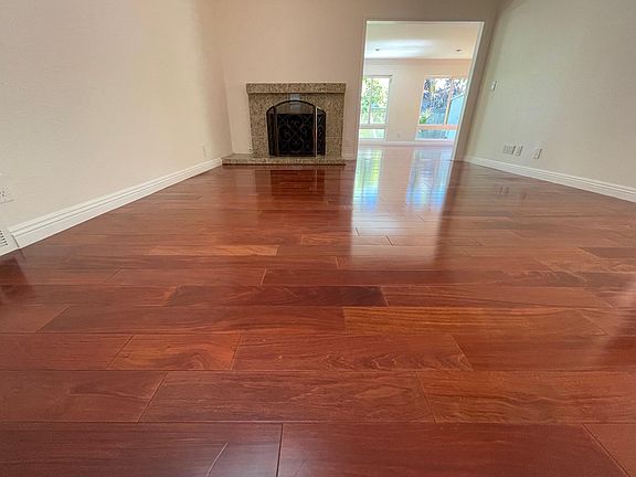 Spacious Living Room Connecting to Family Room