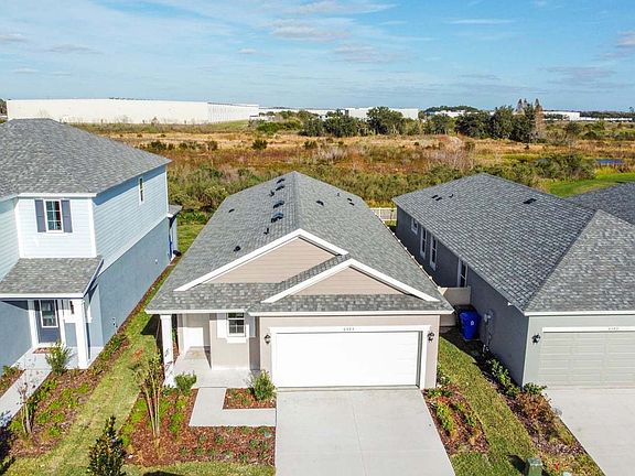 Cypress new construction quick move-in home plan front centered view at BridgeWater in Lakeland, FL