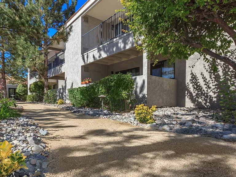 Sagecliff Apartments Shaded Walkway and Landscaping