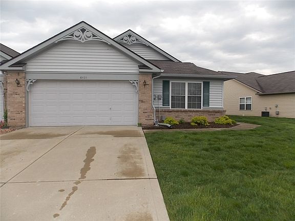 Front exterior - Second angle.  This condo offers nice landscaping.