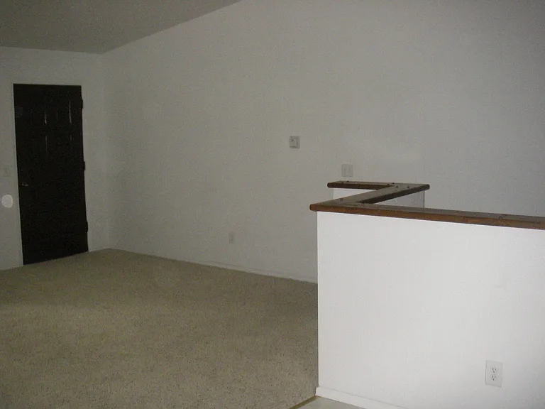 Where stairs enter living room.
