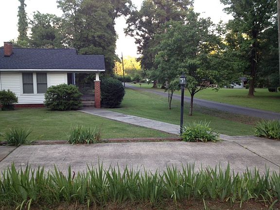 Porch overlooks private lane