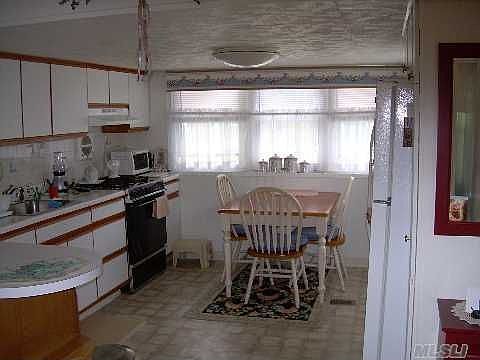 4th image of 703 Fresh Pond Ave Unit 144