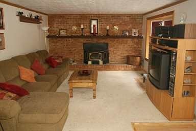 family room w/wood buring fp & stove insert