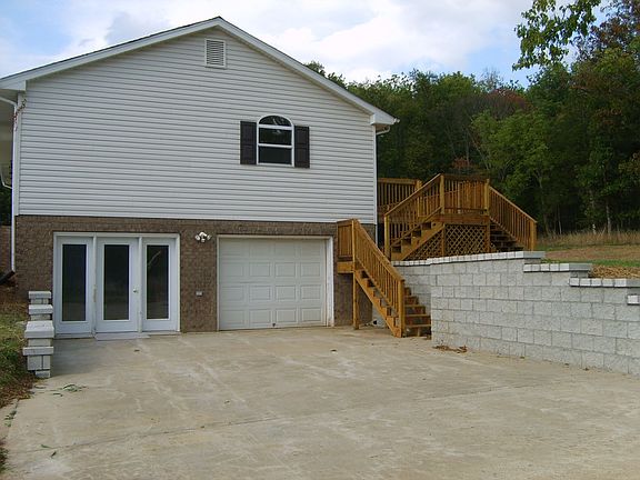 Open Basement 1/2 finished other garage