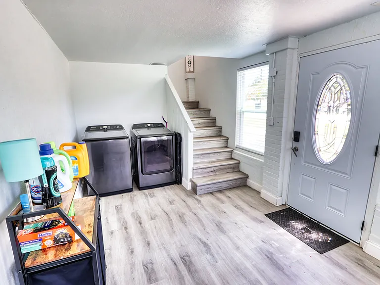 Unit is professionally staged; furniture and decor shown in photos are not included. Rented unfurnished.