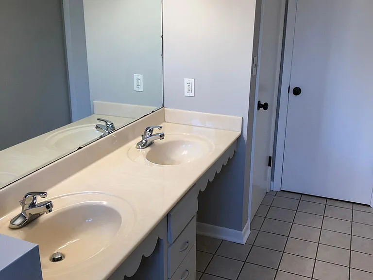 Main bath also features linen closet