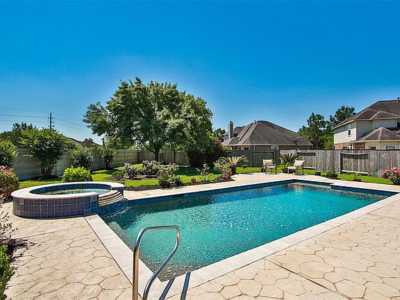 This gorgeous pool/spa is surrounded by a beautiful yard. Huge lot with no back neighbors!