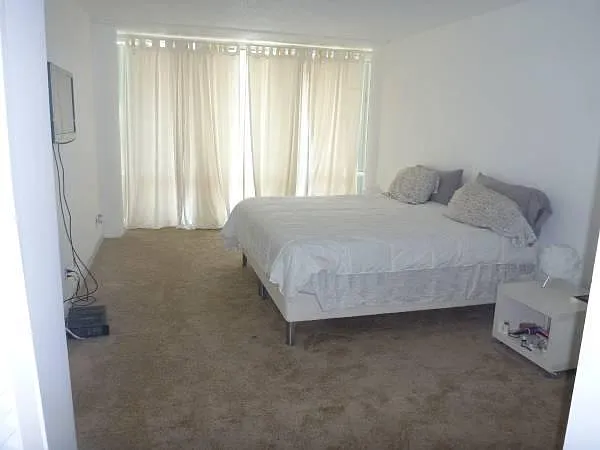 Large bedroom. This is a king size bed!