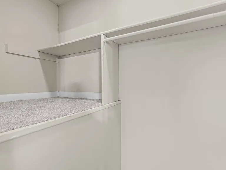 Gold Home Closet With Built-In Storage