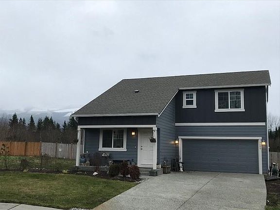 Exterior showing views of mountain and large lot.