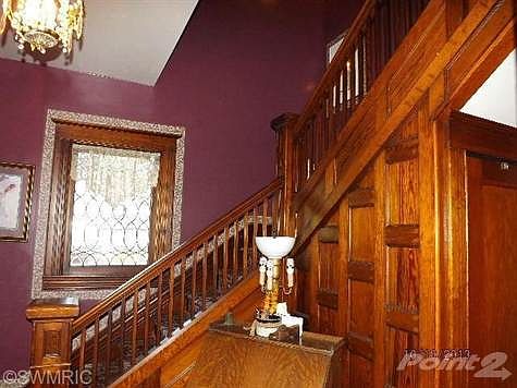 Original Woodwork and Doors. Stairs to Upper Level go to 4 Large Bedrooms and Full Bath.