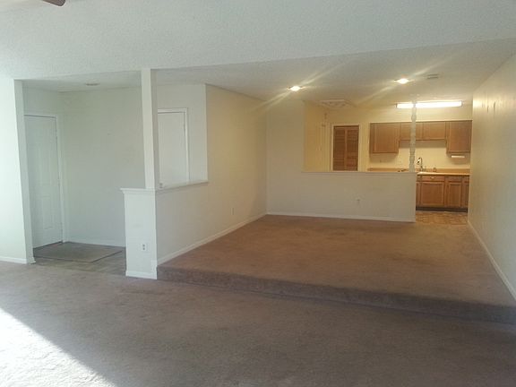 Family room looking through dining into kitchen