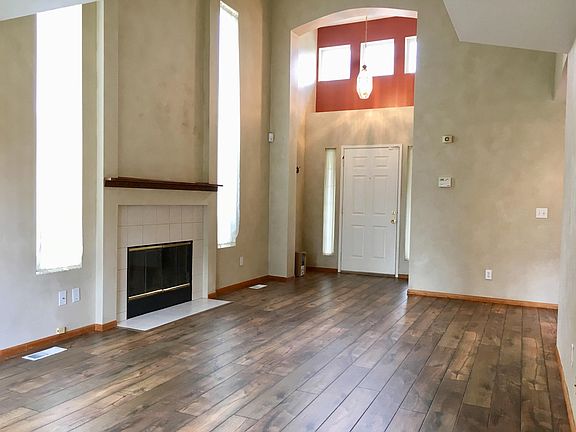 Great room and front door, new laminate floor installed spring of 2018.