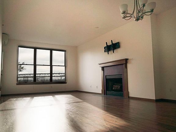 Living room with fireplace and TV mount