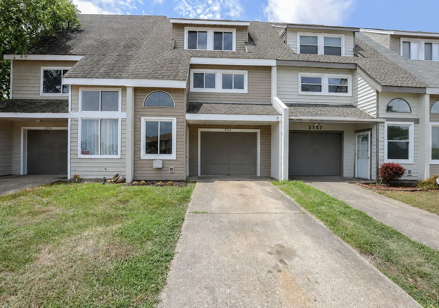 Surprisingly Spacious 3-Story Townhome With Garage and Huge Back Yard — Photo 1