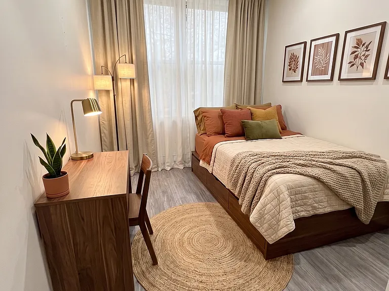 Bedroom 1- This room has been virtually staged using AI to help visualize its layout and design potential.