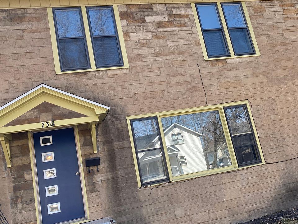 Front Home with new front door - New windows and painted brick will be added soon