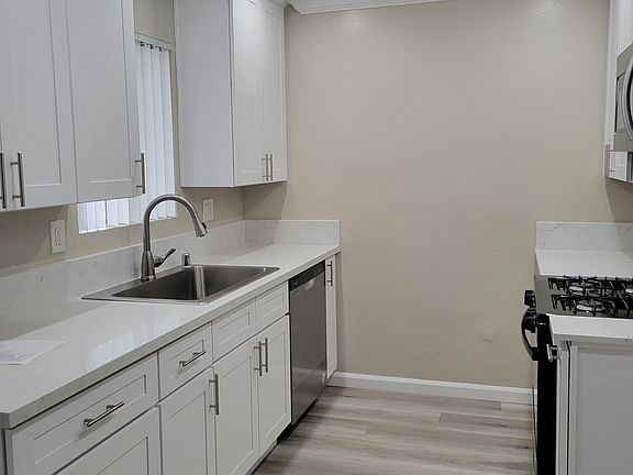 All new kitchen! Quartz countertops, recessed lighting, soft close shaker cabinets, and farmhouse sink.