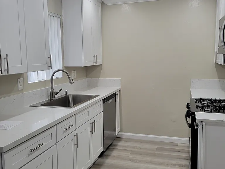 All new kitchen! Quartz countertops, recessed lighting, soft close shaker cabinets, and farmhouse sink.