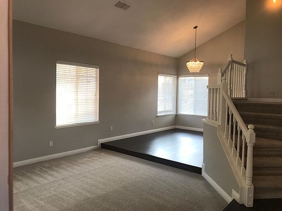 Formal living room to the left. Formal dining room just beyond.