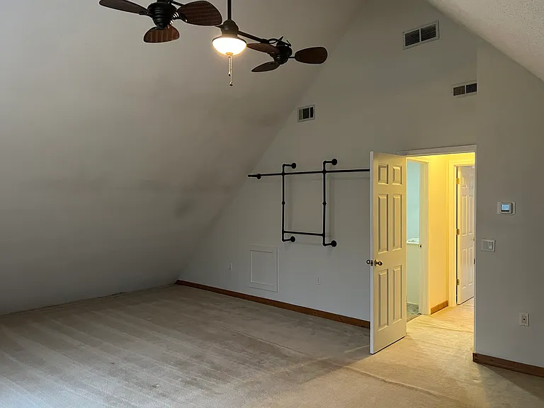 Large bedroom upstairs includes: 
Vaulted ceilings
Large enough for a king bed plus desk or sitting area
Private mini-split heating and air conditioning
Large ceiling fan
Evening sunlight
Shared upstairs bathroom