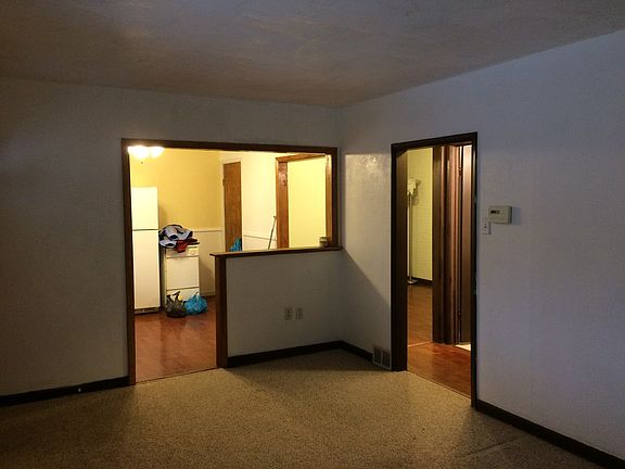 Living room looking into kitchen