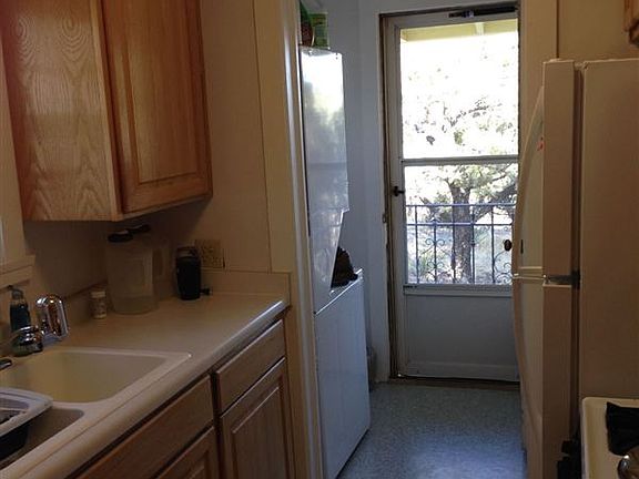 Kitchen with laundry in the rear.