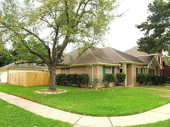 Large corner lot with detached garage.