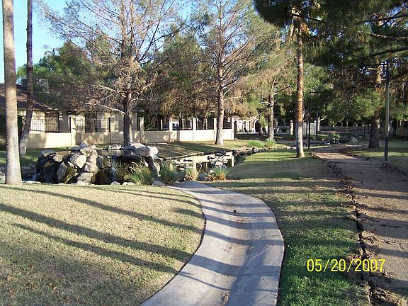 view of pool, stream 