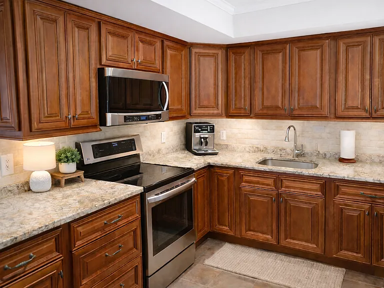 Update Kitchen. Granite Counter Tops, Undercount Sink. Stainless appliances. Washer & Dryer. Opening up to the Dinning Room and Living Room.