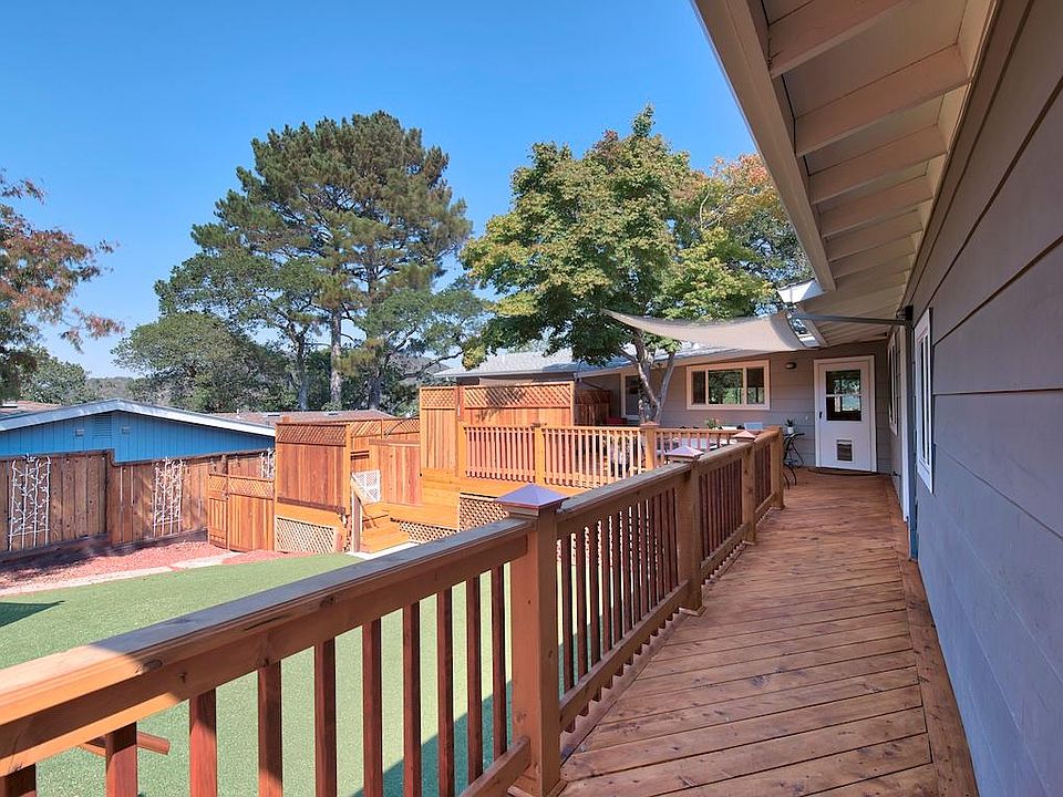 New Cedar Deck and large fenced lawn. (From street entrance)