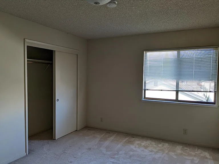 Second bedroom (10'6"x 14'7") and closet (7'6"x 24")