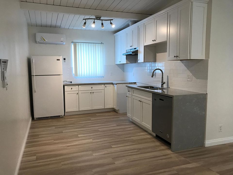 Kitchen, has stainless steel fridge and stainless steel stove (not shown in picture)
