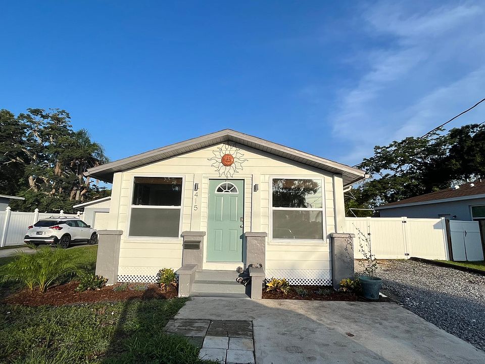 Front entrance - 3 car parking before double gate to backyard; boat or RV storage behind the gate