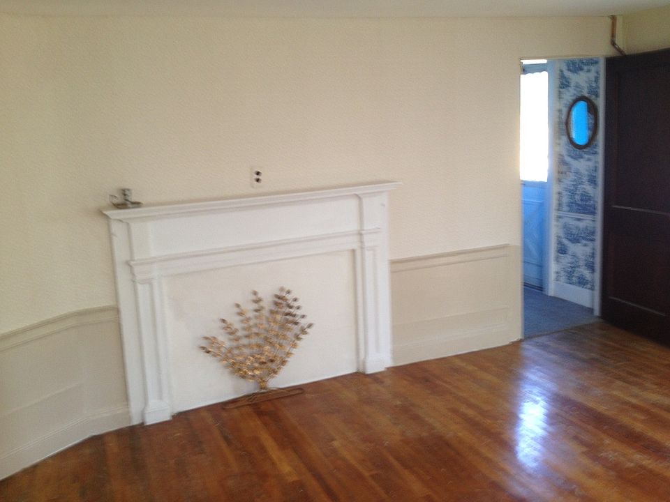 Living room has beautiful mantal and hardwood floors, Very s