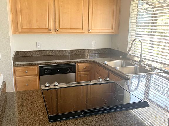 Kitchen with Stainless Steel Appliances and a Garden Window