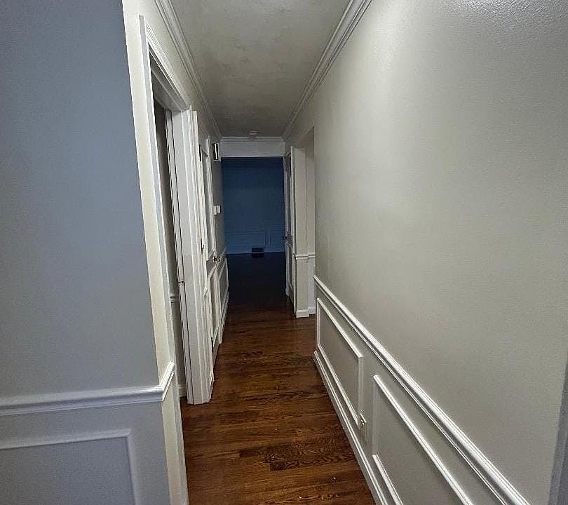 Hallway with hardwood floors