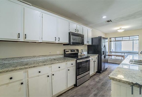 5th image of 6029 Wormar Ave