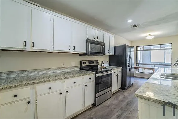 6029 Wormar Ave — Photo 5