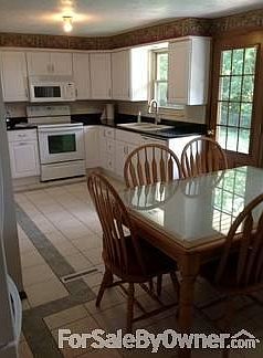 Fully Equiped Eat-In Kitchen
						:
						Appliances Included