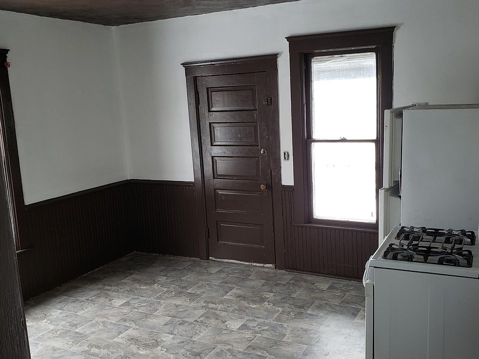 Kitchen, new flooring and faucet , fresh paint, big windows with plenty of daylight