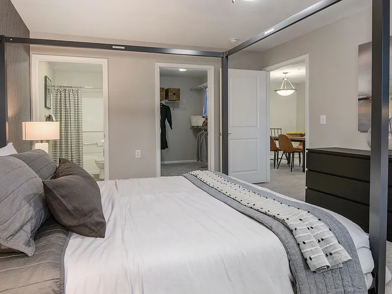 Indulge in spacious master suites featuring vast walk-in closets and an adjoining en suite bath for regal-sized comforts.