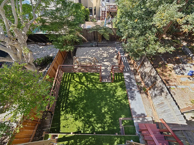 Large, terraced backyard.