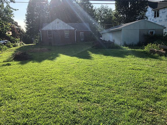 Rear of home with garage 