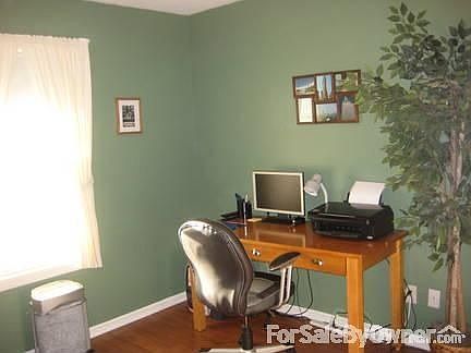 Bedroom / Office : Includes laminate flooring and is currently being used as an office.
