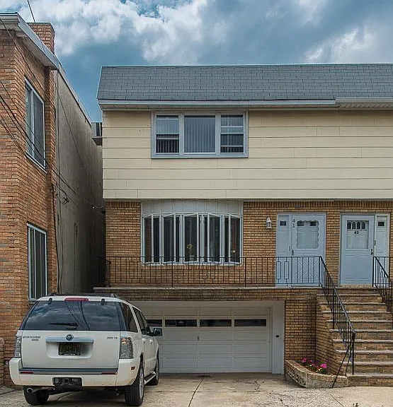 Front view, Parking Space & Garage