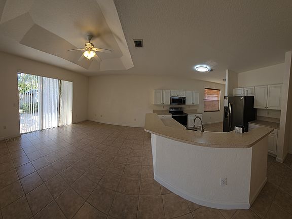 Family room and view of kitchen