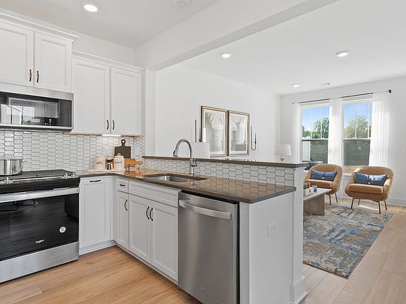 Refined kitchen layout of The Churchill Design offering both entertaining space and everyday functio